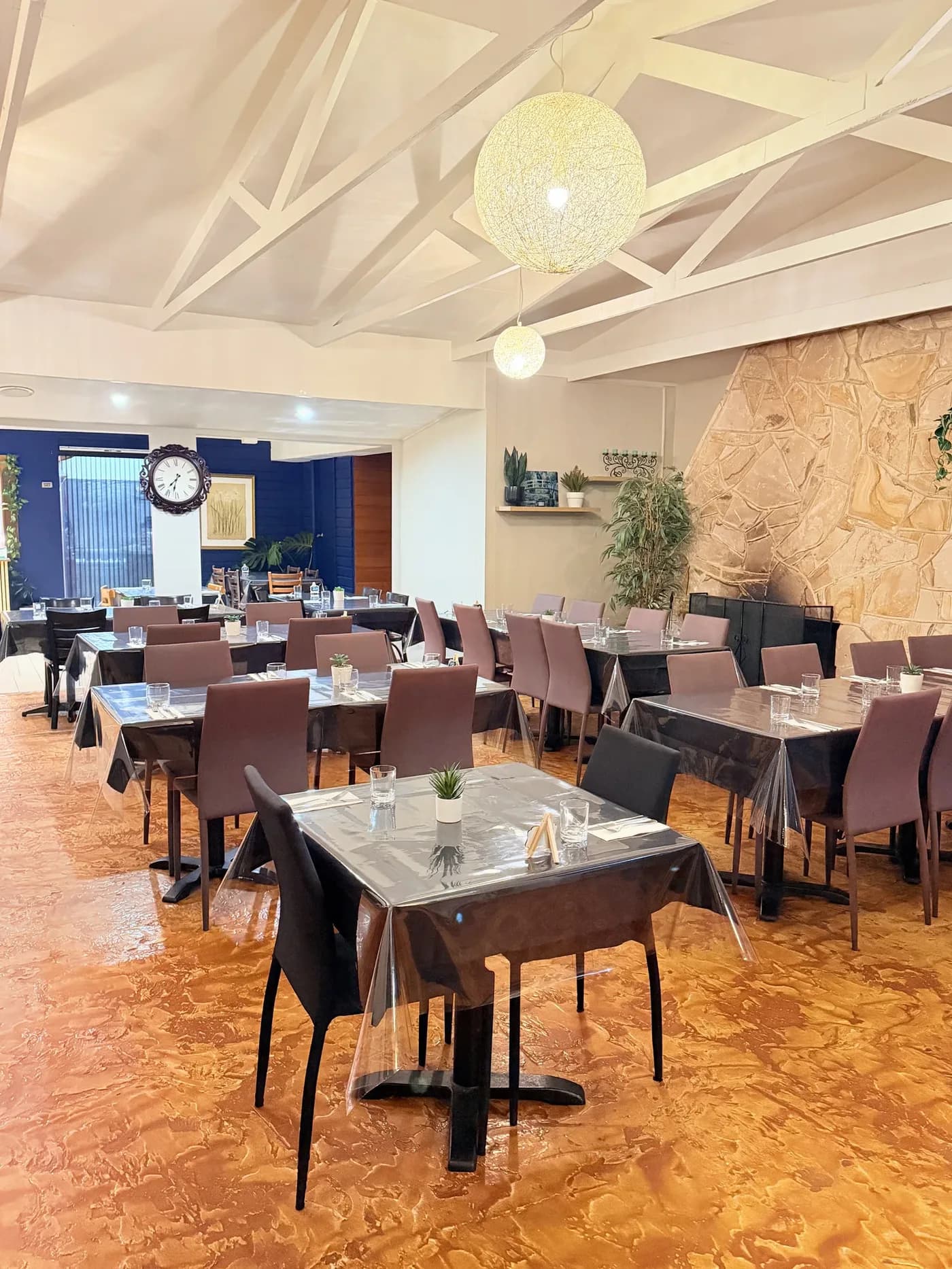 Restaurant interior seating at TASSIE FLAME in Cambridge